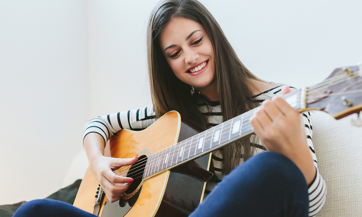 Girl playing guitar